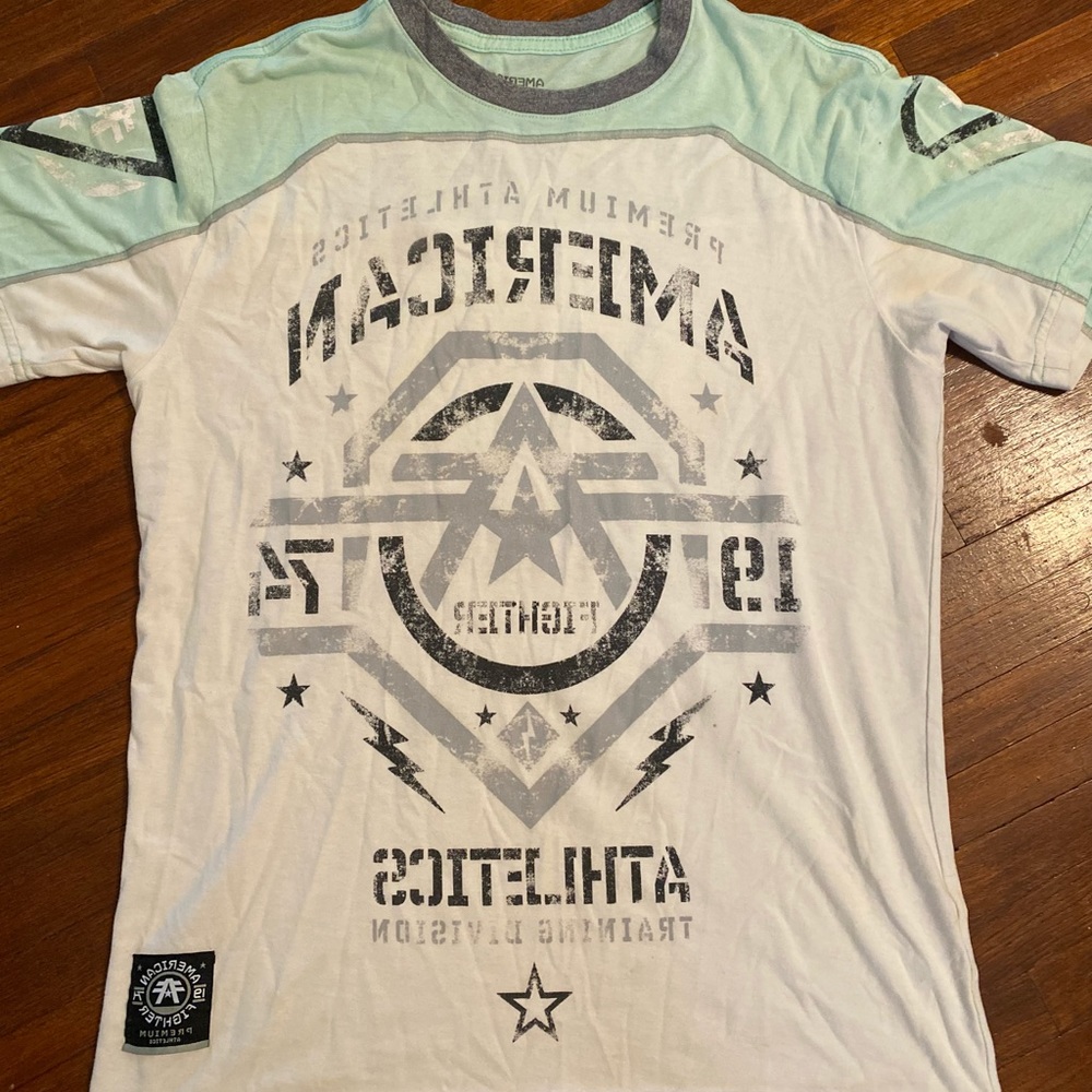 Multiple buckles shirts and tanks.